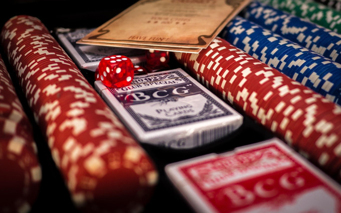 Live blackjack table with croupier dealing cards for Evolution Gaming live casino